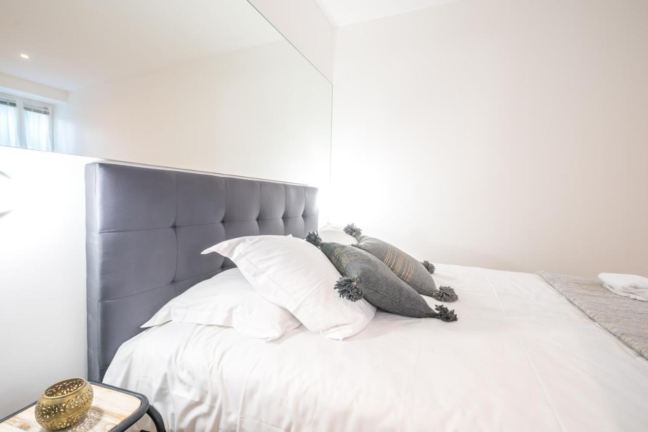 Happy Days - Eiffel Studio & Terrasse Apartment ปารีส ภายนอก รูปภาพ